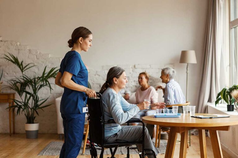 Older adult and family member reviewing a care plan together in a bright assisted living apartment.